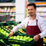 man supermarket as shop assistant 20446866